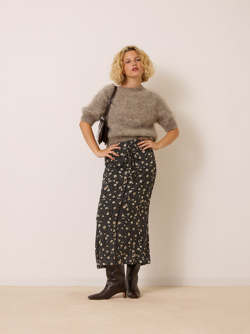 ABBY black Fleurs de Nuit floral print midi skirt, front view by Rouje