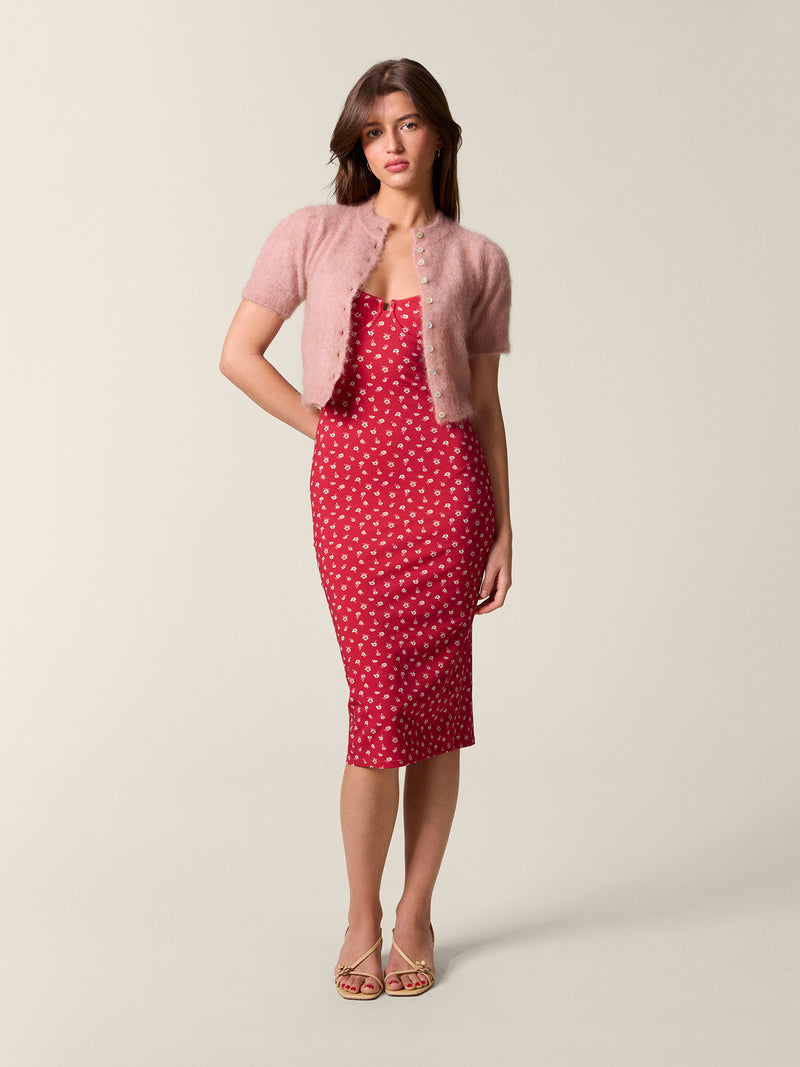 Front view of the red Arielle dress worn with the pink Abelina short-sleeve cardigan.