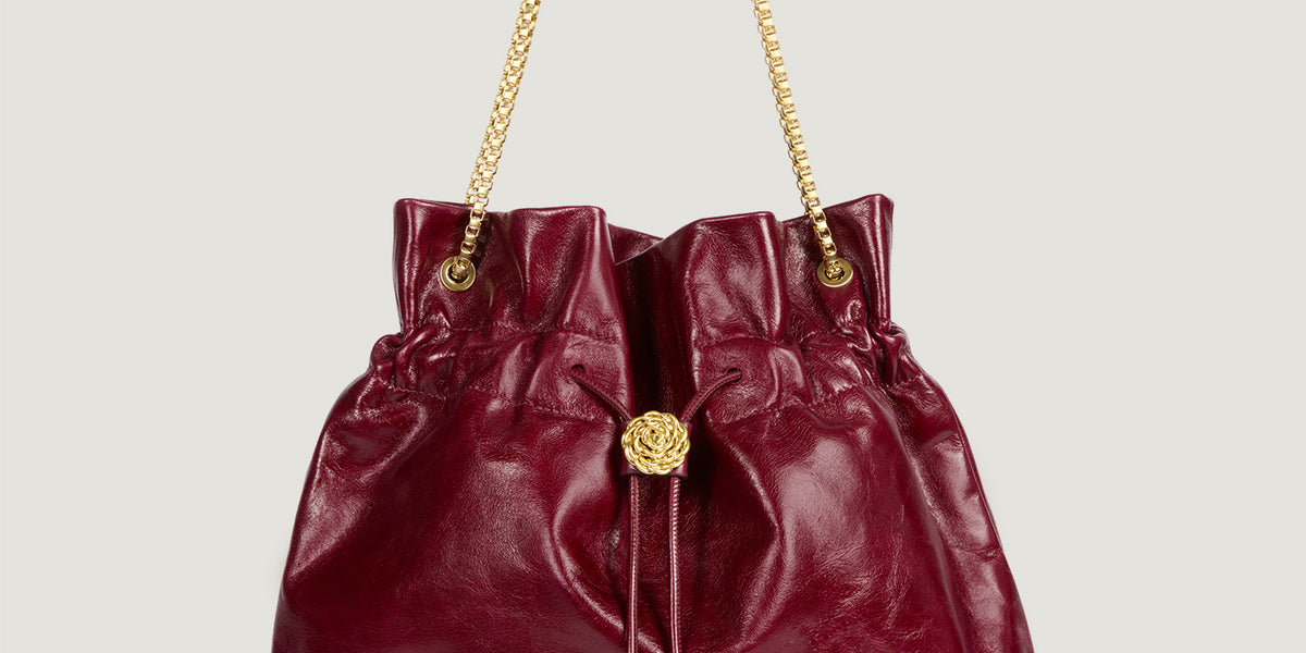 Grand sac bourse en cuir vernis bordeaux Rouje