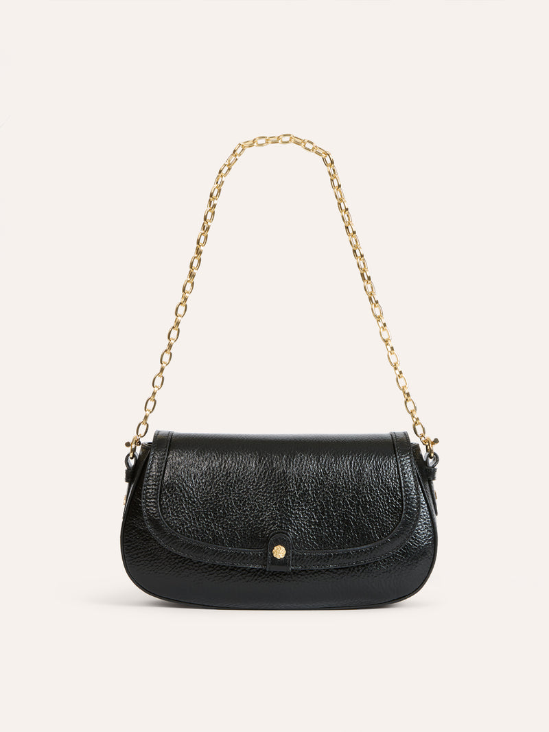 DARLING black grained leather bag worn on a model by Rouje