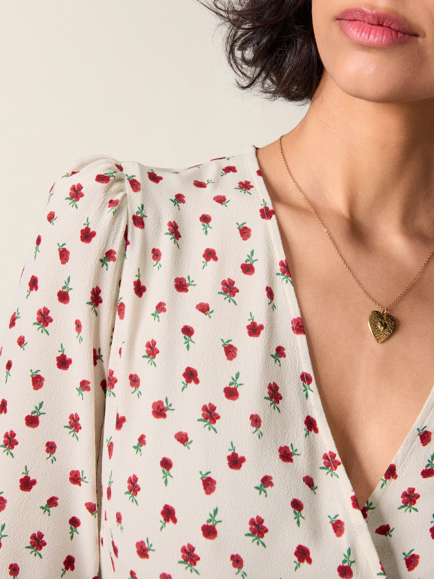 Close-up of the red flower print on the gabin dress.