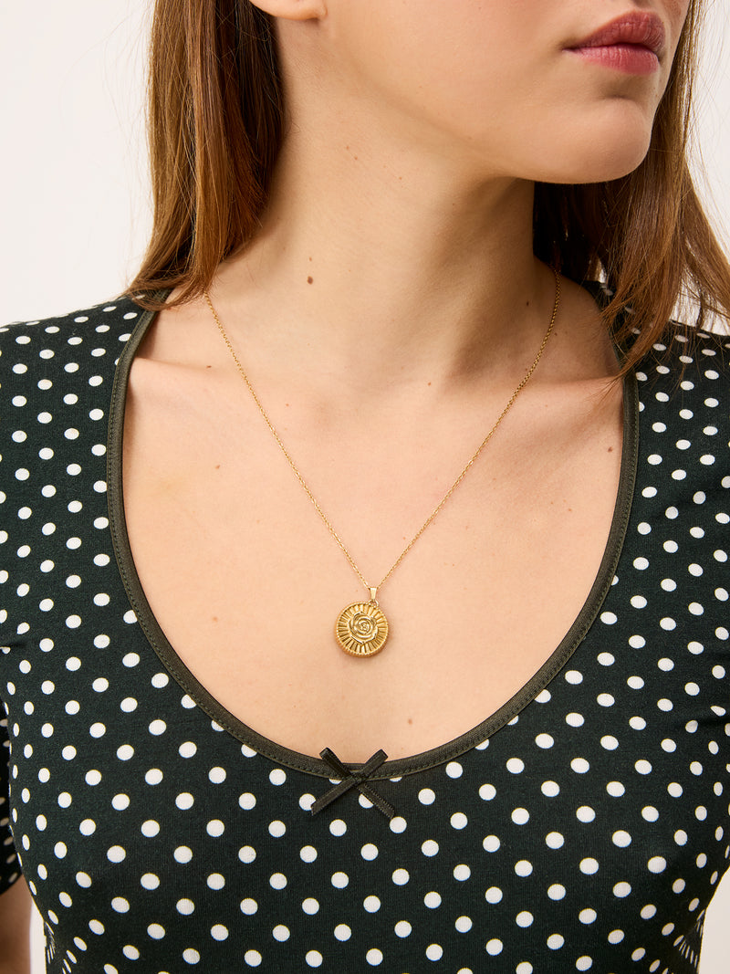 Close up of the neckline of the bodysuit