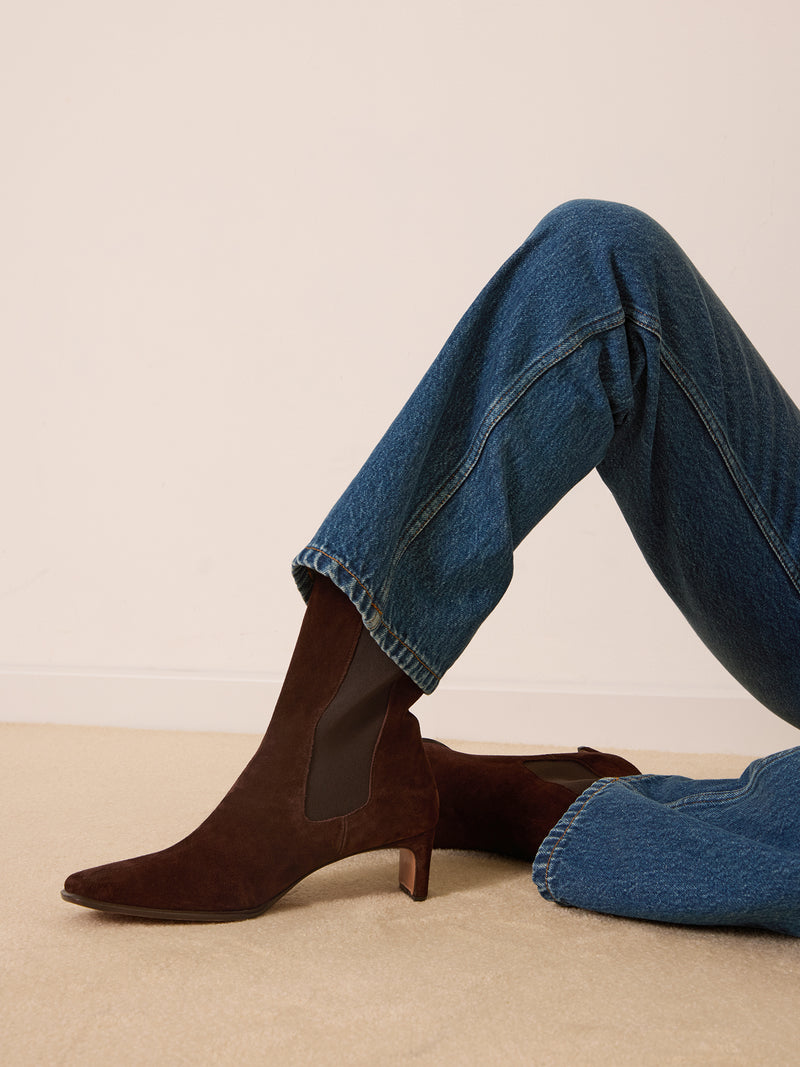 CHELSEA ebony suede ankle boots worn on a model by Rouje
