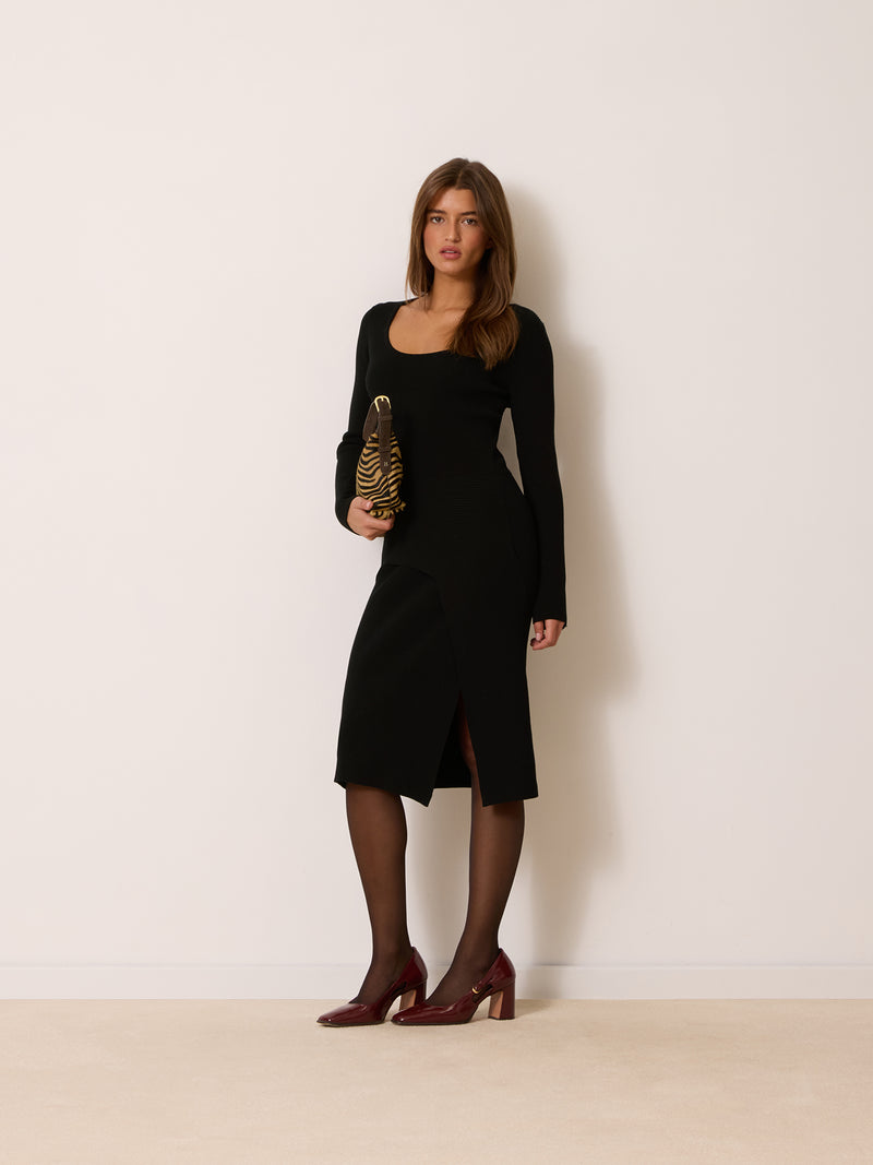 JOSE black ribbed knit midi dress worn on a model by Rouje