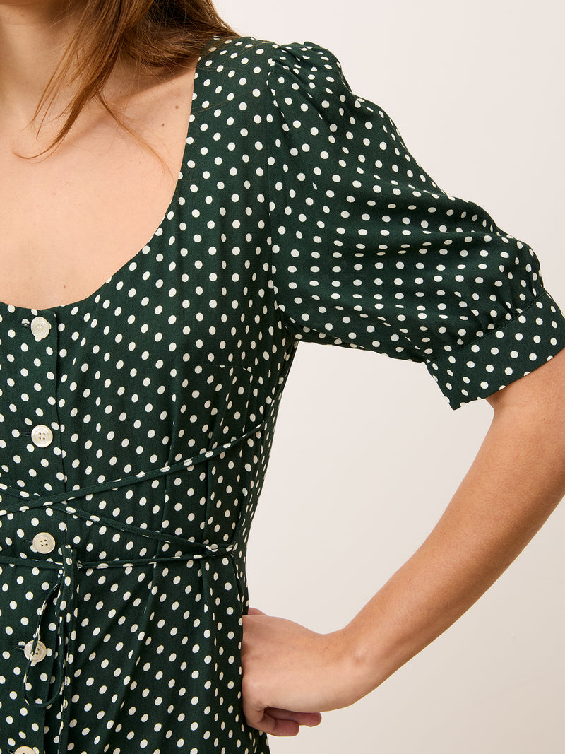 Close-up of the sleeve on the Julia green polka dot dress