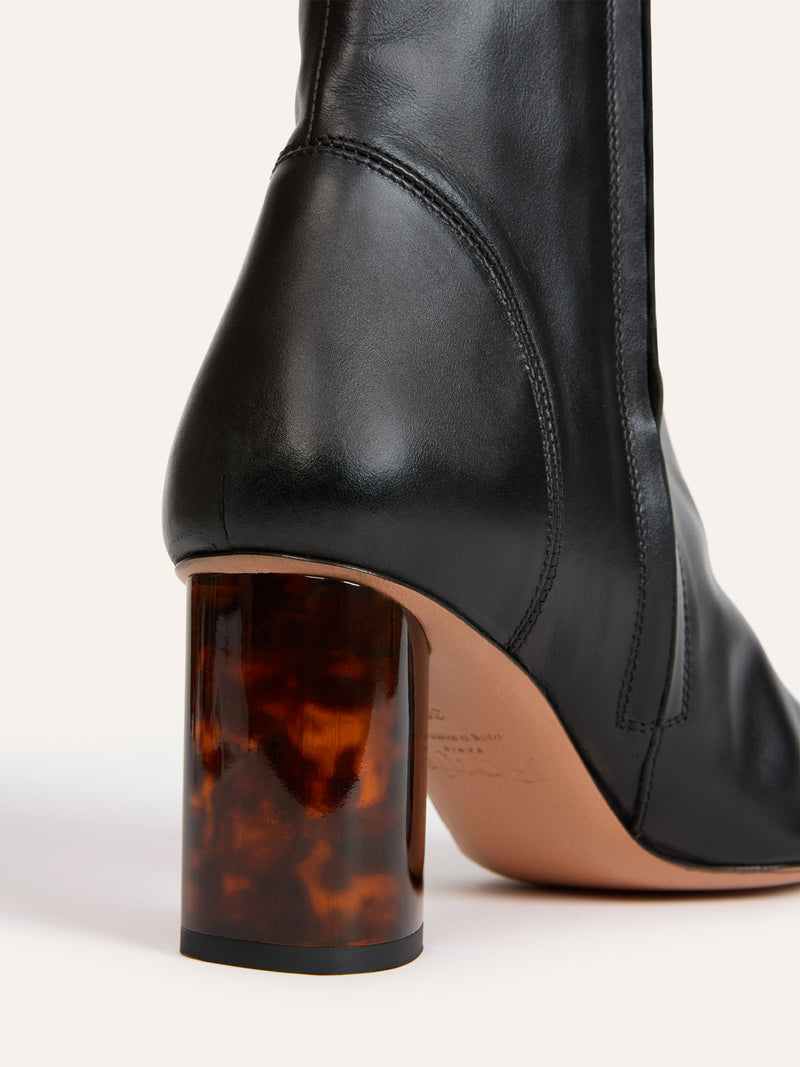 LOULA black leather ankle boots, flat packshot by Rouje