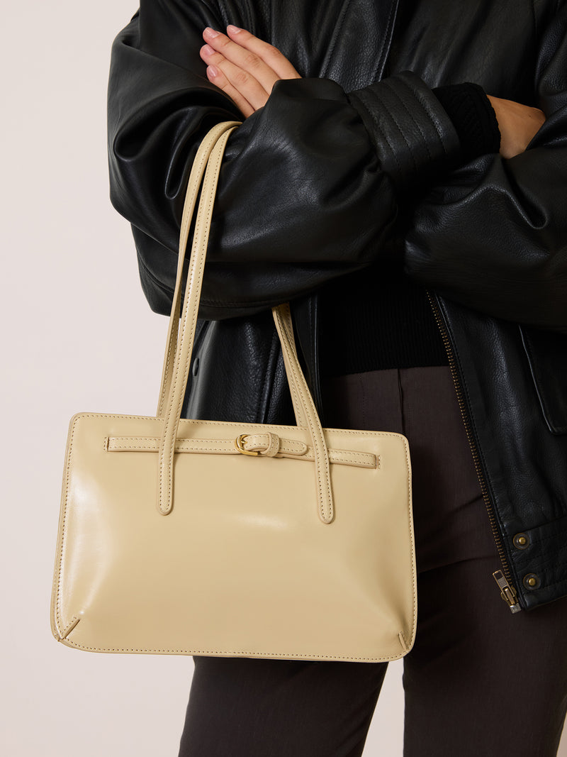 FIANCE champagne glazed leather handbag with double strap, front view by Rouje