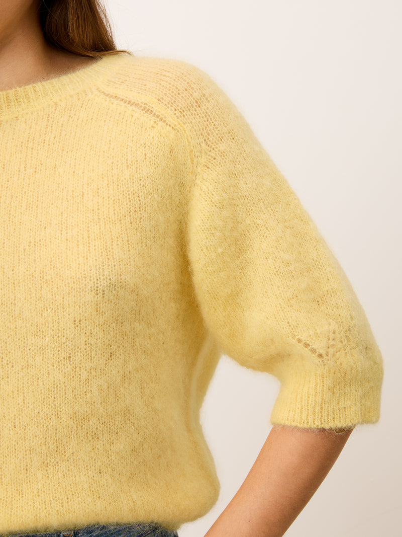 Close-up of the sleeves on the Olivia mohair sweater in yellow