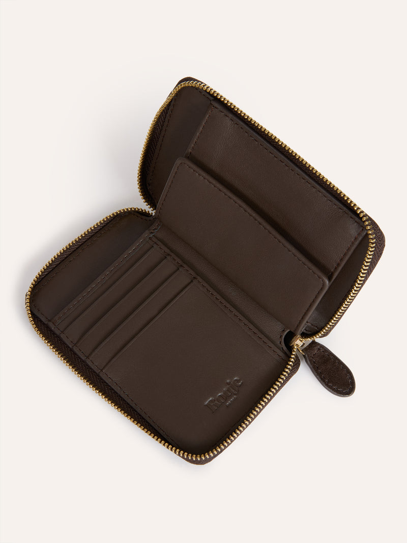 Open view of the Ristretto split leather wallet in ebony with golden zipper closure.