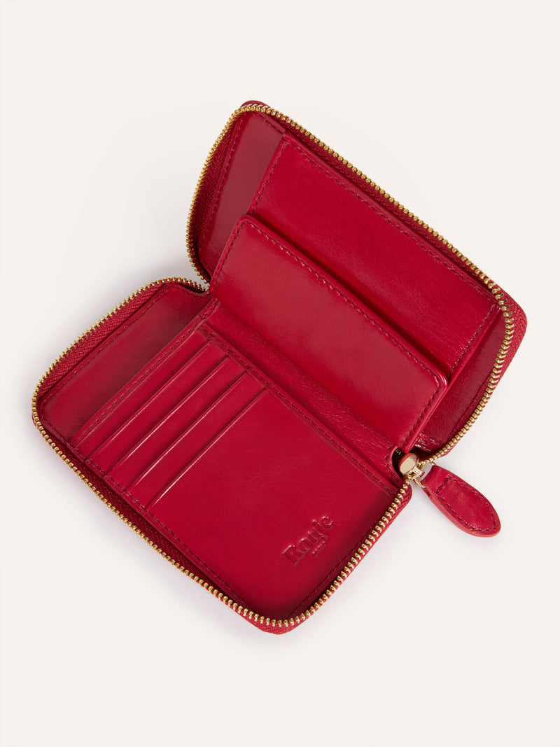 Open view of the Ristretto red aged leather wallet with golden zipper closure.