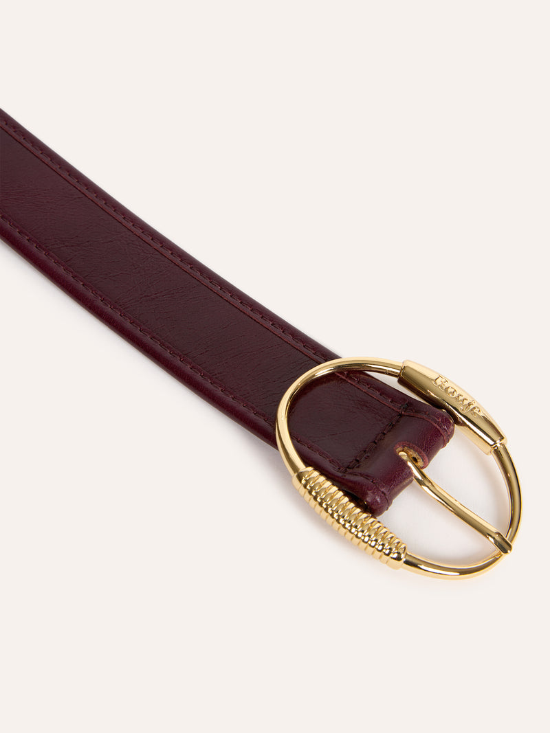 TAMISE bordeaux aged leather wide belt, worn on a model by Rouje