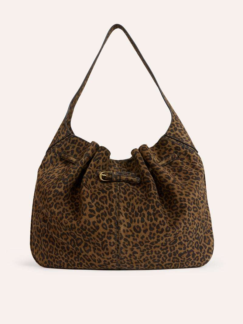 TRESOR leopard suede large bag worn on a model by Rouje
